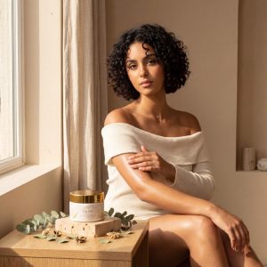 Rita applying AIDA Smoothing Body Butter